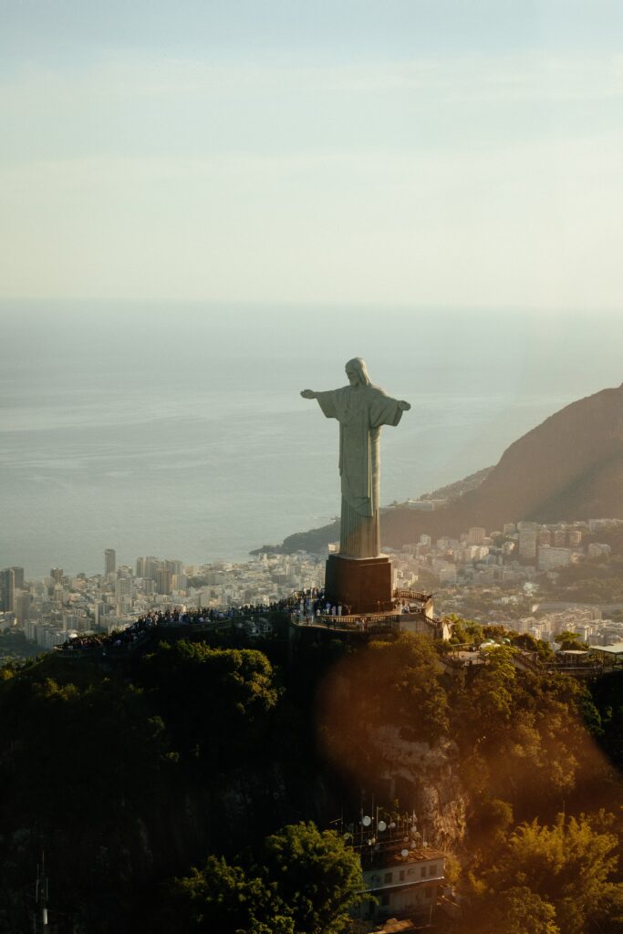 Statue of Jesus Christ on mount in evening